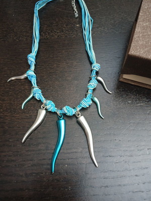 Necklace with metallic horn pendants and turquoise cords like new