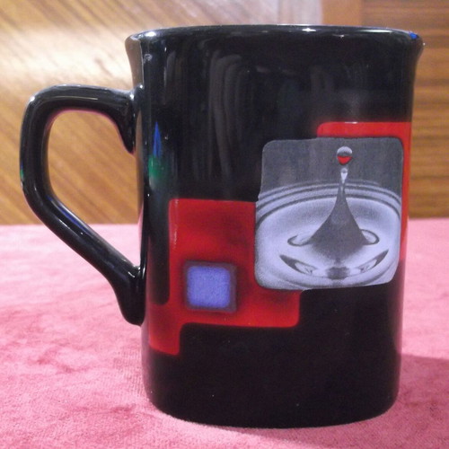 Nescafe ceramic mug black, like new, engraved logo