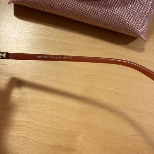 Miu Miu round orange sunglasses