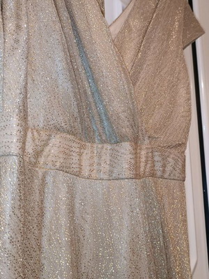 Official long dress new, gold color, fits small-medium
