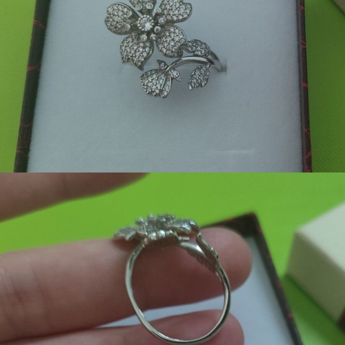 Silver 925 ring used, resizable, flower design
