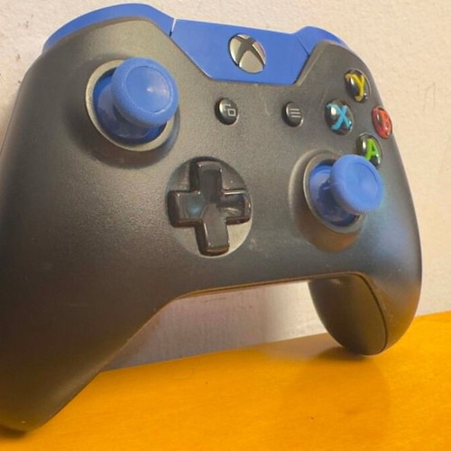 Xbox One wireless controller used with blue buttons