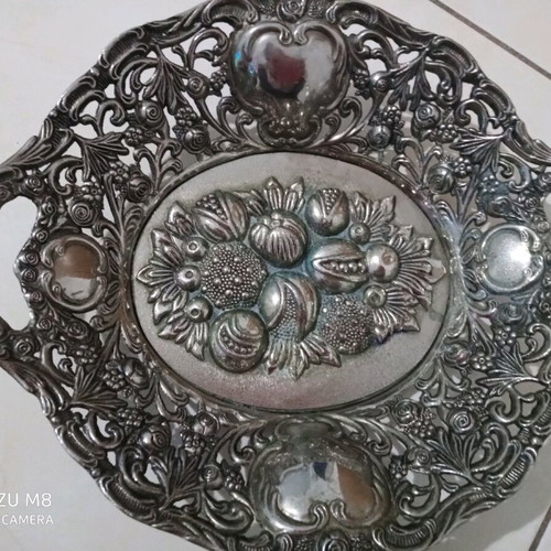 decorative fruit bowl with embossed design