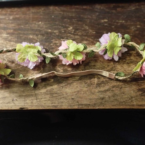 Hairband wreath used with 5 pink purple flowers and green leaves