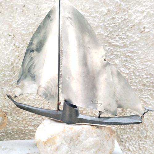 Handmade metal decorative ship made to order with white stone base