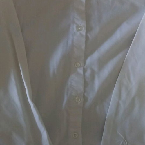 White shirt used with slight discolorations, size XS