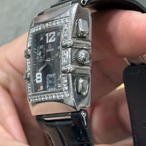 Omega watch authentic with real diamonds like new, black