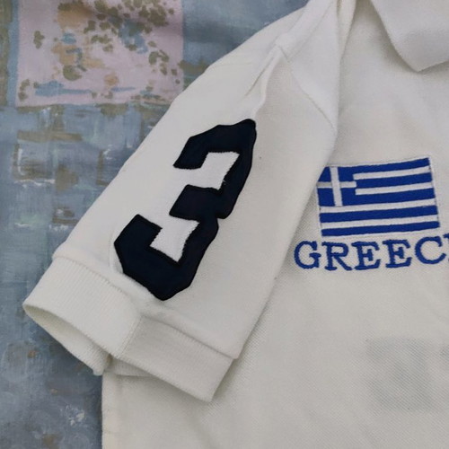 Children's white polo Greece used, size S