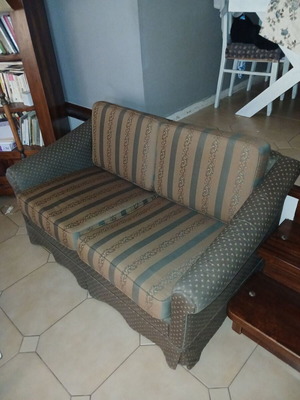 Two-seater sofa like new