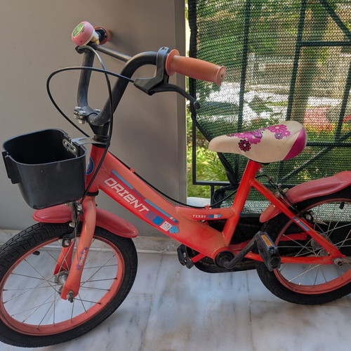 Orient 16" children's bike, red, with basket