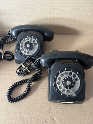Two collectible telephones, black, corded