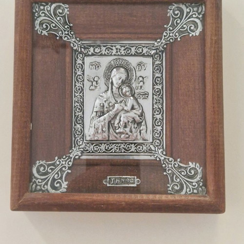 Old Virgin Mary icon used in wooden frame from Megalochari Tinos