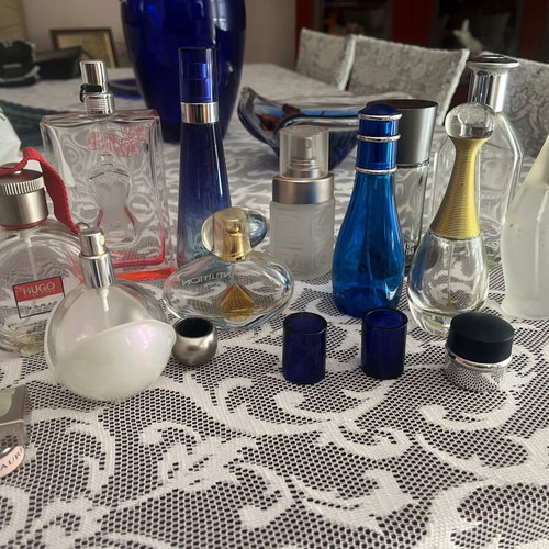 Empty bottles of famous perfumes like new for collection