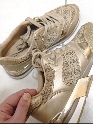 Guess women's gold sneakers used with glitter details