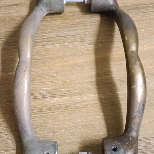 Pair of vintage brass door handles 1950 with natural patina used