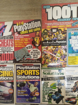 Retro PlayStation Guides lot like new, 8 magazines and books with codes