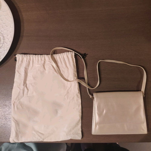 Evening handbag hand-held like new, gold color