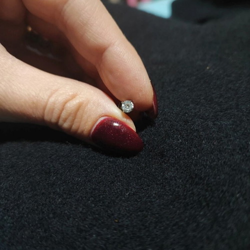 Silver earring new with rhinestones