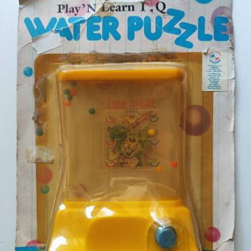 Play'N Learn IQ Water Puzzle vintage electronic game like new