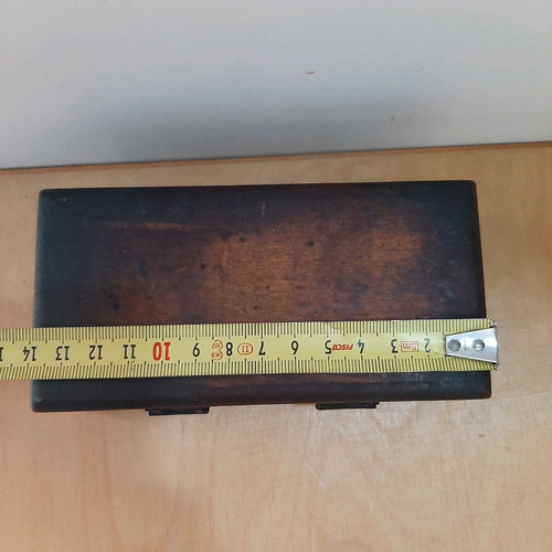 Wooden box with bronze weights used