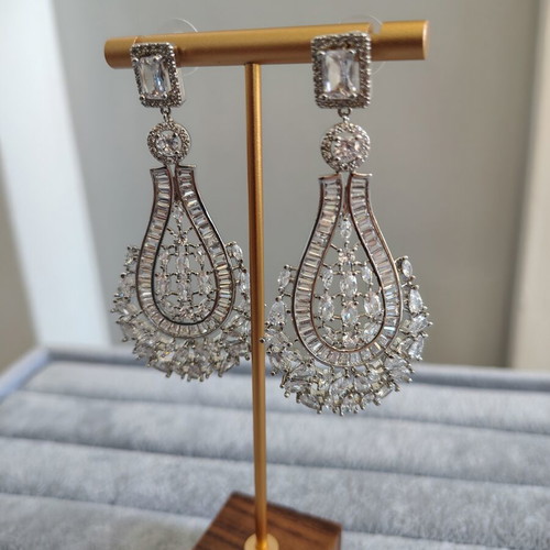 Long silver plated earrings with zircon stones