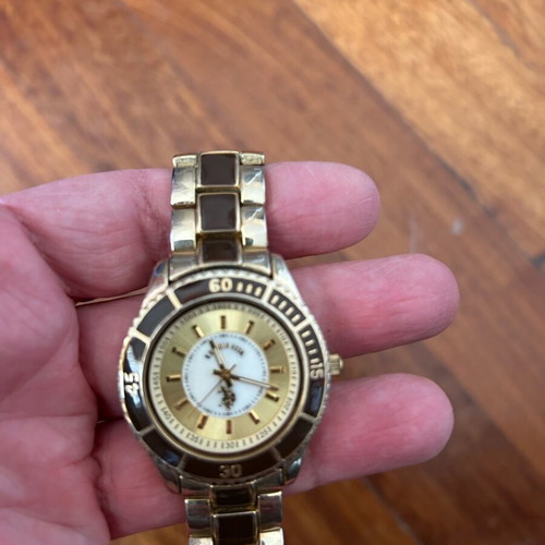 U.S. Polo Assn. women's watch used, gold with black bezel
