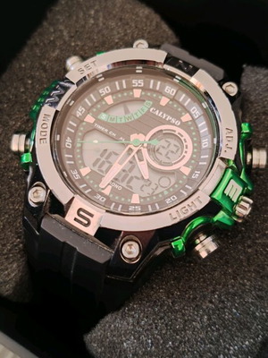 Calypso watch like new, green and silver
