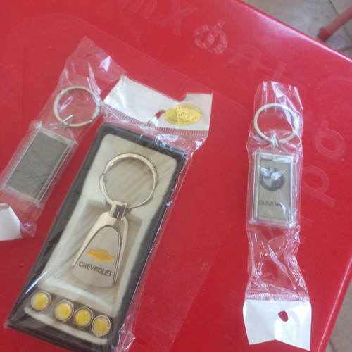 Car keychain set with solar light and valve caps, Chevrolet included