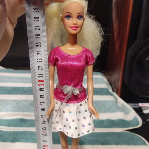 Barbie doll Mattel used with stains on dress
