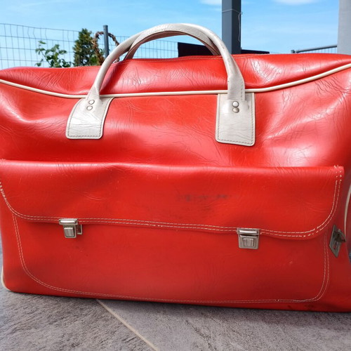 Vintage red suitcase bag used with zipper defect