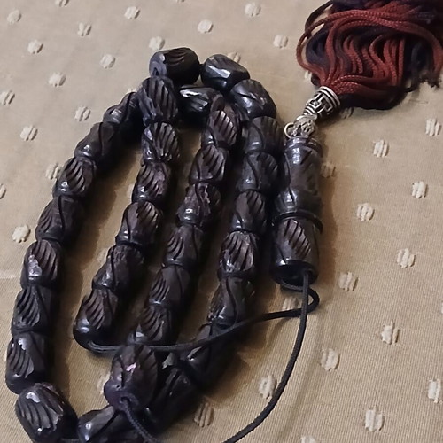 Komboloi bone engraved worry beads used with metal elements and tassel