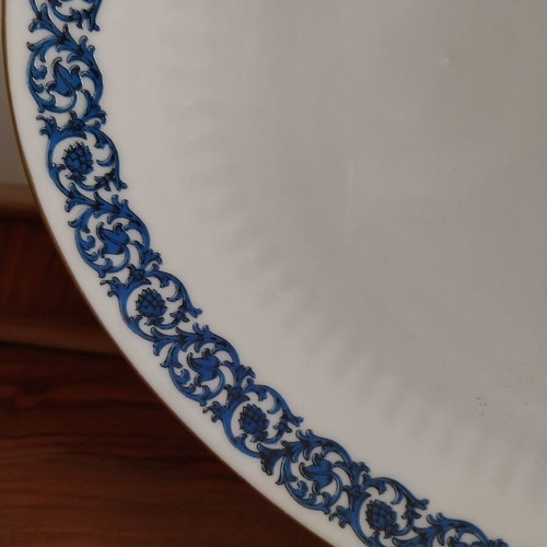 Porcelain like new, 2 Limoges salad bowls and 2 Sherzer platters