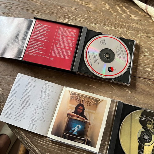 The Doors CDs used, one double and one single