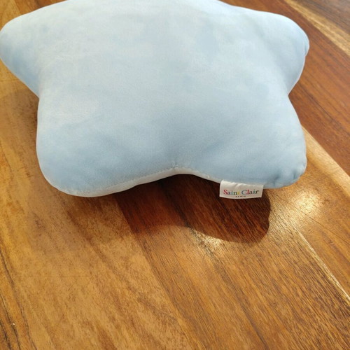 Saint Clair decorative star-shaped pillow used
