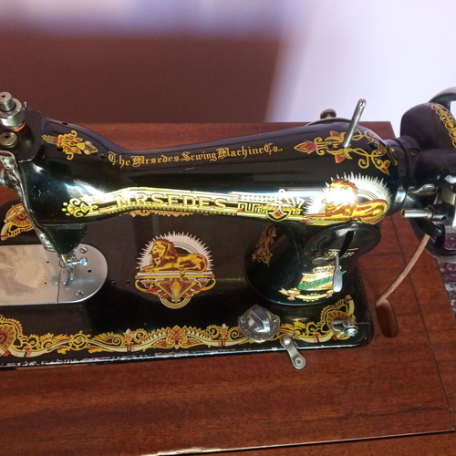 Mrsedes sewing machine used with antique furniture