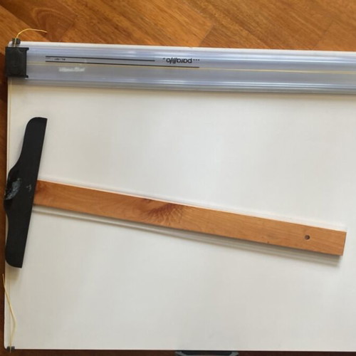 Drawing board with parallel ruler and Schoeller Canson drawing papers used