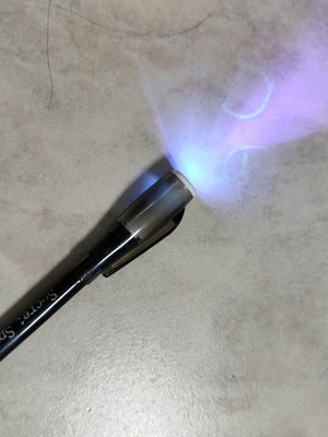 Pen flashlight with hidden light like new