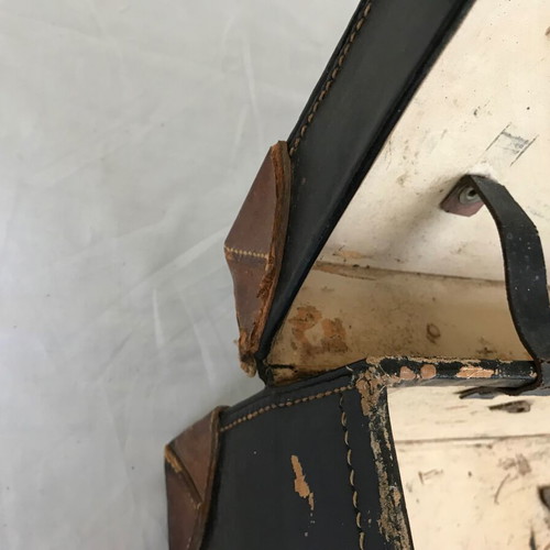 Small antique suitcase used with wear