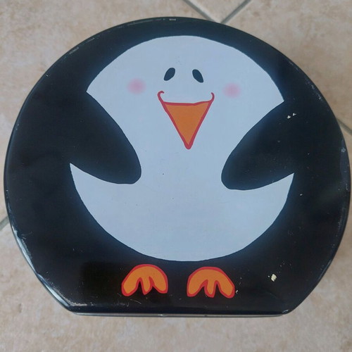 Tiger metal storage box with penguin design like new