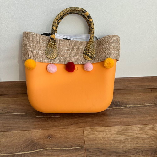 O bag handbag orange with pom-poms