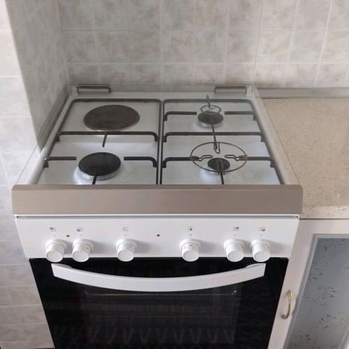 Gas stove with electric oven like new