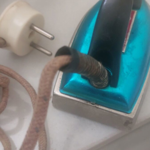 Mini vintage travel electric iron used