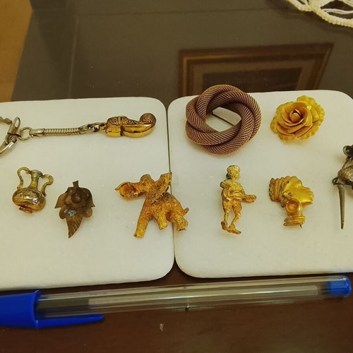 Vintage jewelry collection used, pins, brooches, and keychains