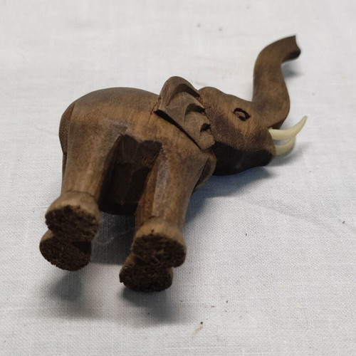 Vintage wooden elephant used with ivory tusks