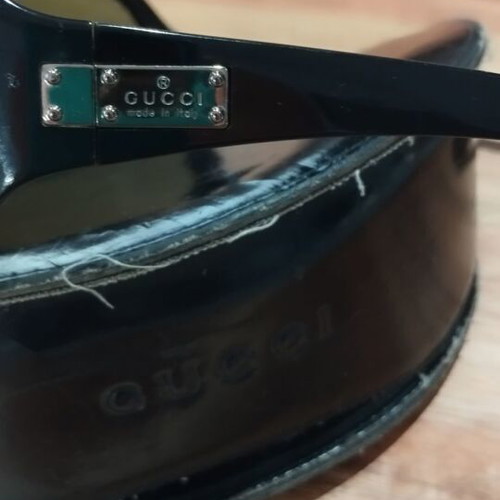 Gucci sunglasses used, black with excellent lens