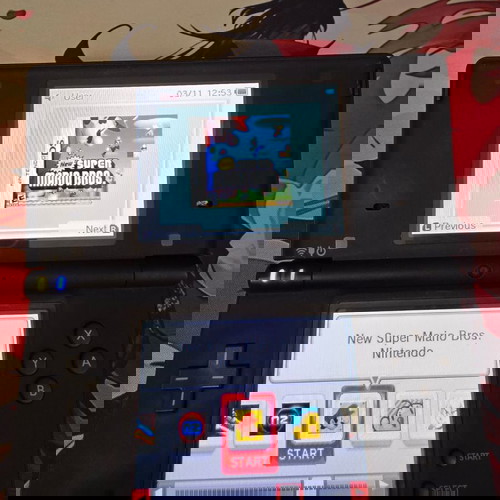 Nintendo DSi като нов с стотици игри и 32GB карта