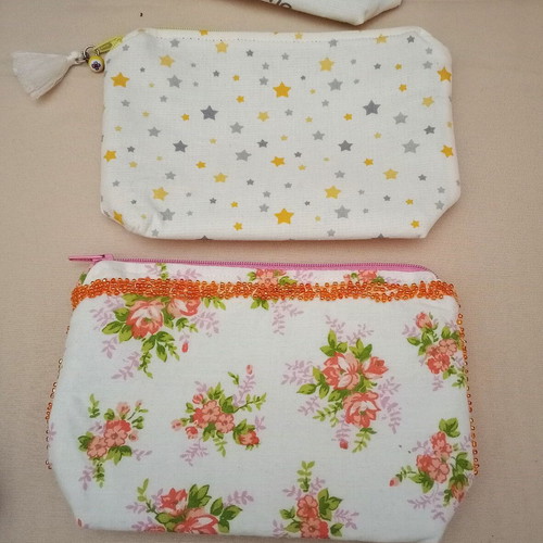 Set of 7 toiletry bags and 1 black satin pouch new, multicolored