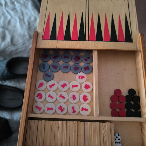 Mini travel chess set used with chess, checkers, backgammon and dominoes