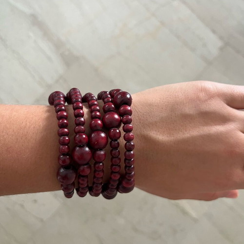 Wooden spiral bracelet like new with adjustable diameter and brown-red beads