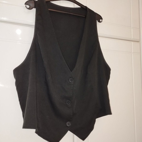Women's black suit vest used